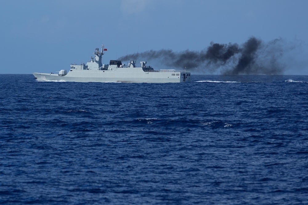 A Chinese navy ship floats near during Philippine military multi-service joint exercise on Wednesday, Nov. 6, 2024, off Loaita island locally called Kota island at the disputed South China Sea, Philippines (AP)