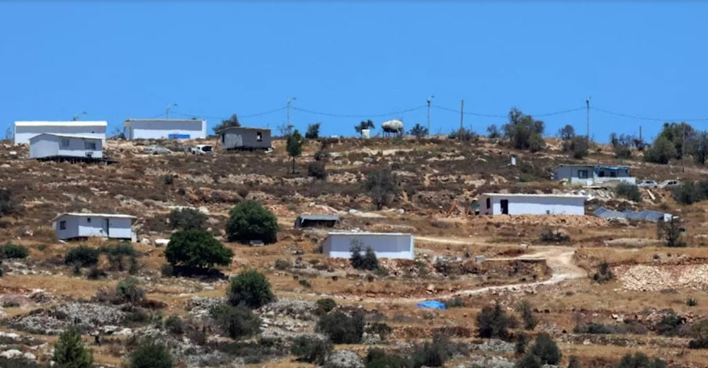 An Israeli settlement outpost north of the village of Burqa, east of Ramallah in the Israeli-occupied West Bank, 15 July 2025. (AFP)