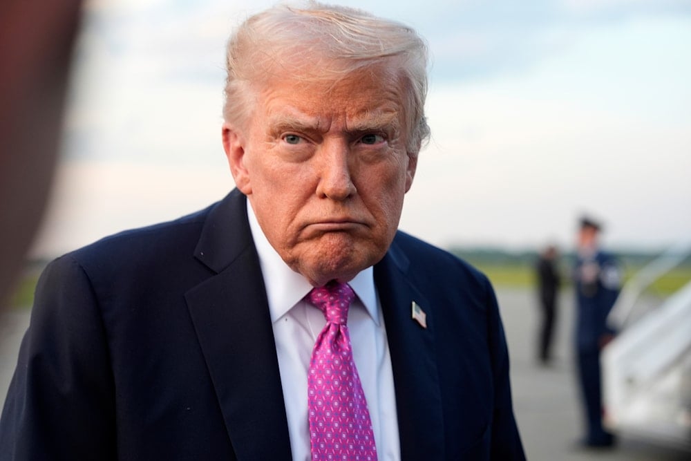President Donald Trump speaks with reporters before boarding Air Force One at Morristown Airport, Sunday, Sept. 14, 2025, in Morristown, NJ (AP)