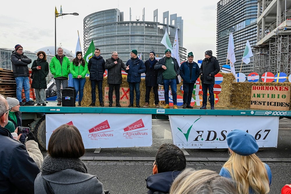 French farmers protest against the Mercosur agreement outside the European Parliament, Wednesday, Jan. 22, 2025 in Strasbourg, eastern France (AP)