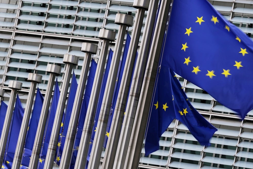European Union flags flap in the wind outside EU headquarters in Brussels, Wednesday, Sept. 3, 2025 (AP)