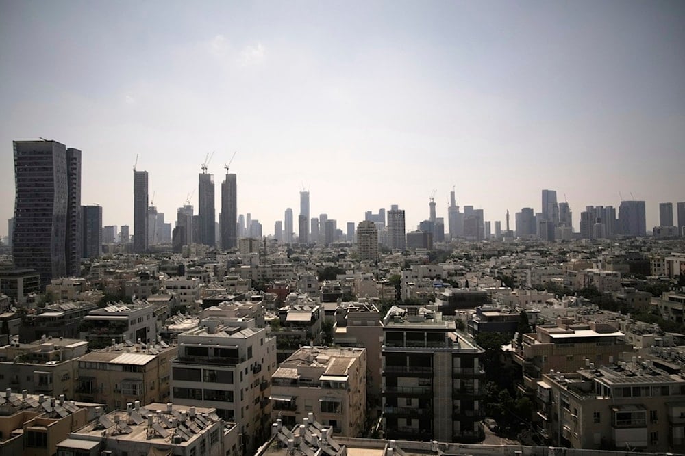 A general view of Tel Aviv's skyline, Friday, June 13, 2025. (AP Photo/Leo Correa)