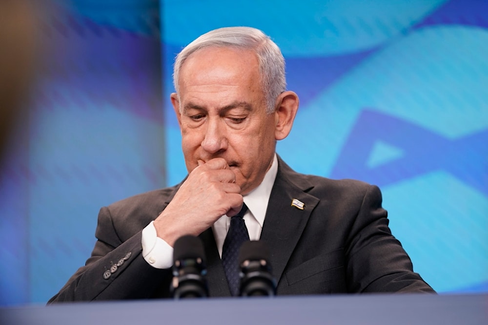 Israeli Prime Minister Benjamin Netanyahu reacts at a joint press conference at the Prime Minister's Office, in Jerusalem, Monday, September 15, 2025. (Nathan Howard/Pool Photo via AP)