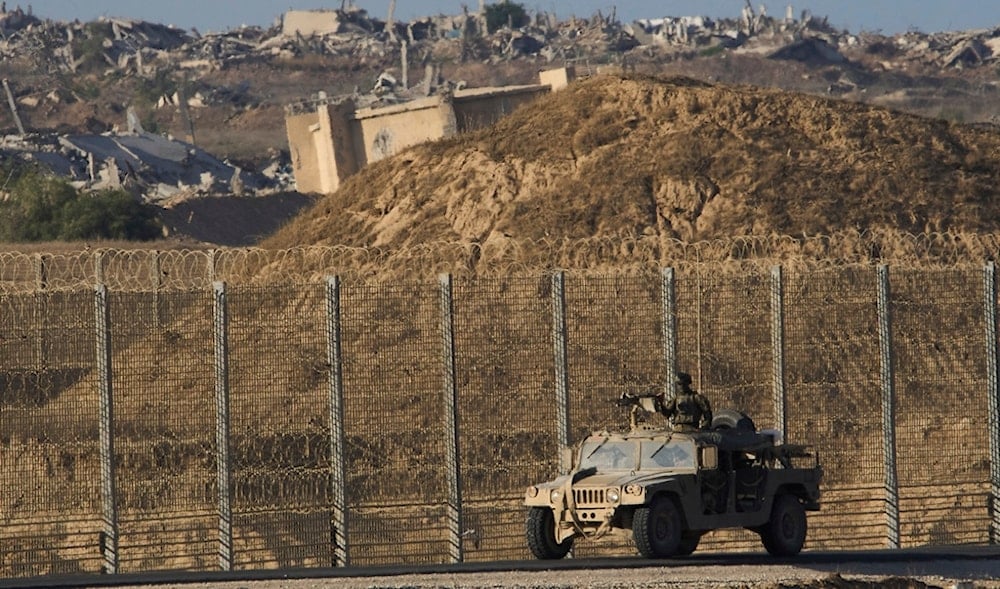 Israeli soldiers drive on the border with Gaza Strip, in southern occupied Palestine, Tuesday, Sep9.9 2025. (AP)