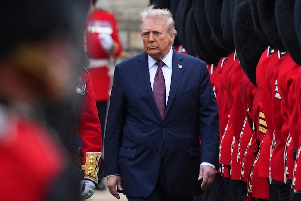 President Donald Trump reviews the Guard of Honour after the arrival at Windsor Castle in Windsor, England, Wednesday, Sept. 17, 2025.(AP Photo/Kirsty Wigglesworth, Pool)