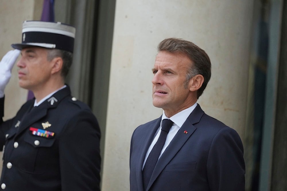 French President Emmanuel Macron waits for the arrival of International leaders invited to attend a summit on Ukraine at the Elysee Palace, in Paris, France, Thursday, September 4, 2025. (AP Photo/Michel Euler)