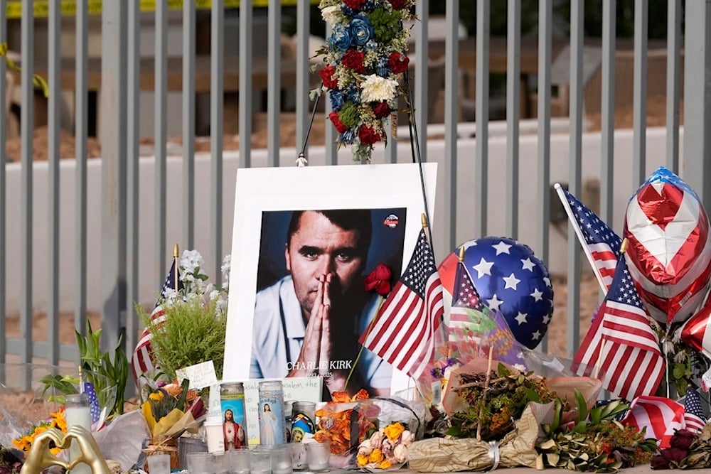 A makeshift memorial grows in size at the Turning Point USA headquarters after the shooting death at a Utah college last Wednesday of Charlie Kirk, Wednesday, September 17, 2025, in Phoenix, the United States (AP)
