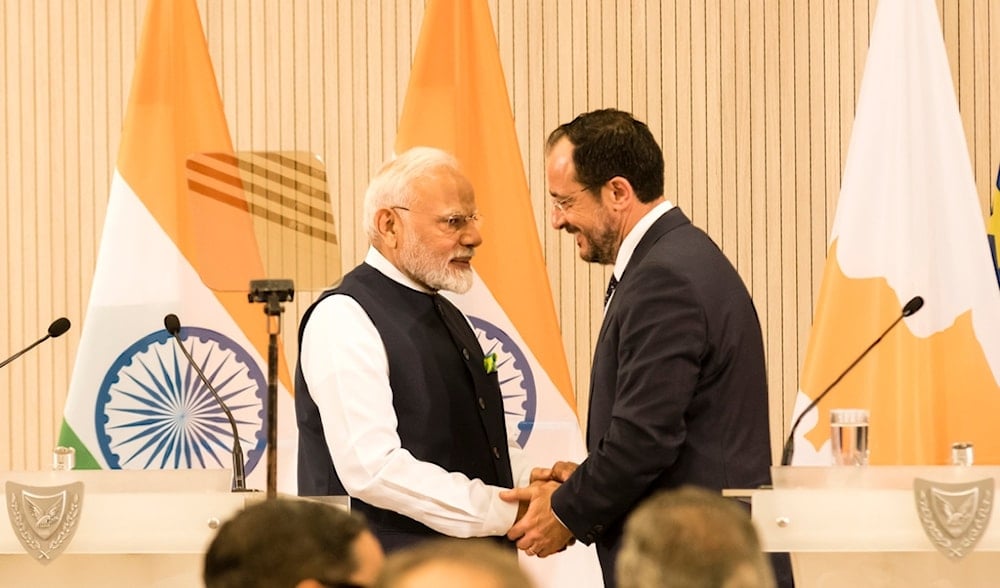 India's Prime Minister Narendra Modi, left, and Cyprus' President Nikos Christodoulides shake hands during their meeting at the Presidential palace in Nicosia, Cyprus, Monday, June 16, 2025. (AP)