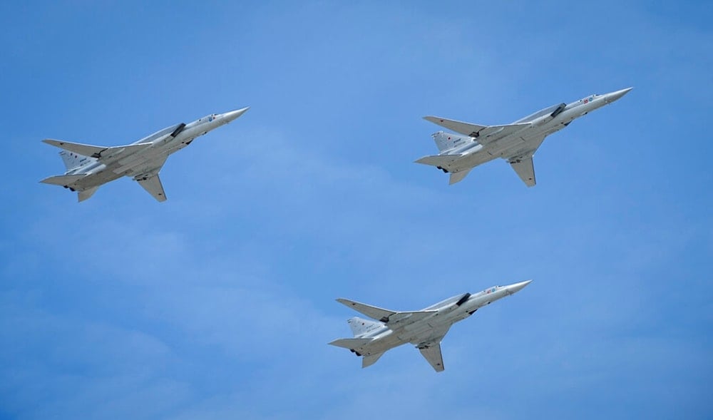 Russian warplanes fly over Red Square during a dress rehearsal for the Victory Day military parade in Moscow, Russia, Saturday, May 7, 2022 (AP)