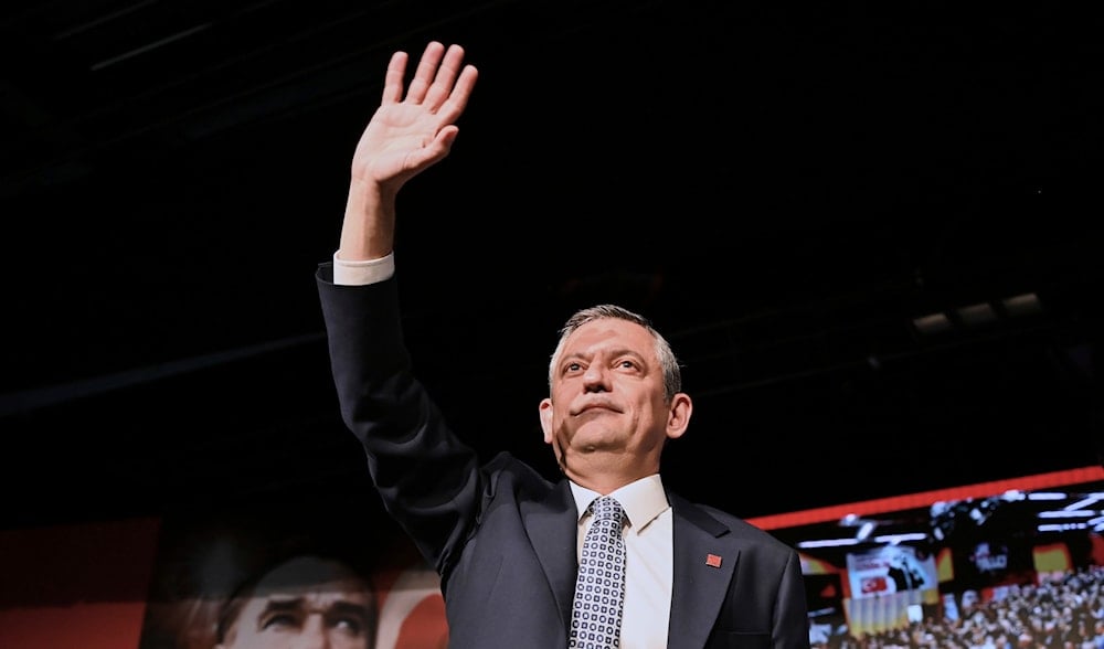 Republican People's Party or (CHP) leader Ozgur Ozel gestures to party members during his speech during a CHP convention, in Ankara, Sunday, April 6, 2025. (AP)