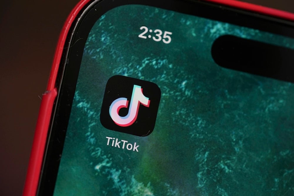 The logo for TikTok is displayed on a mobile phone, Friday, January 17, 2025, in Denver. (AP Photo/David Zalubowski)
