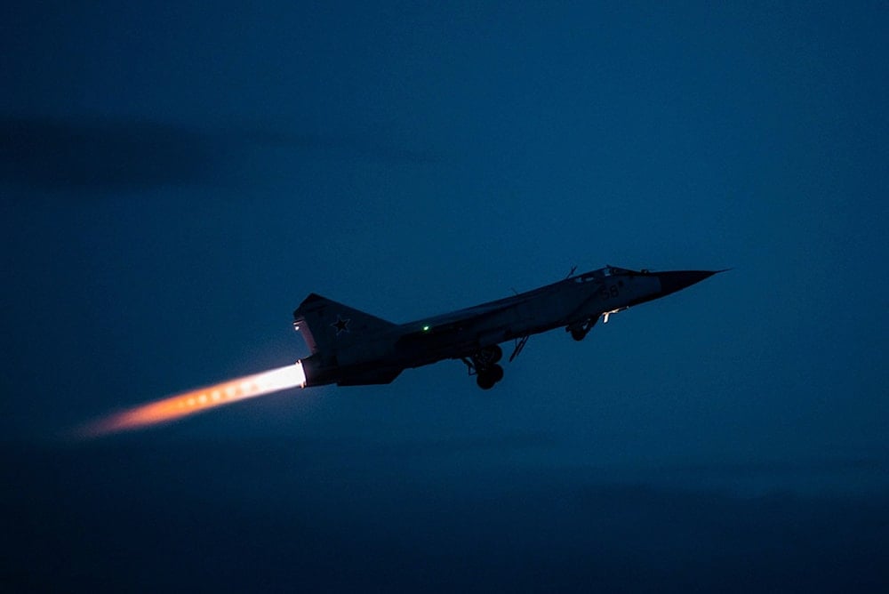 In this photo provided by the Russian Defense Ministry Press Service on Monday, Feb. 14, 2022. A MiG-31 fighter of the Russian air force takes off at an air base during military drills in Tver region, Russia (AP)