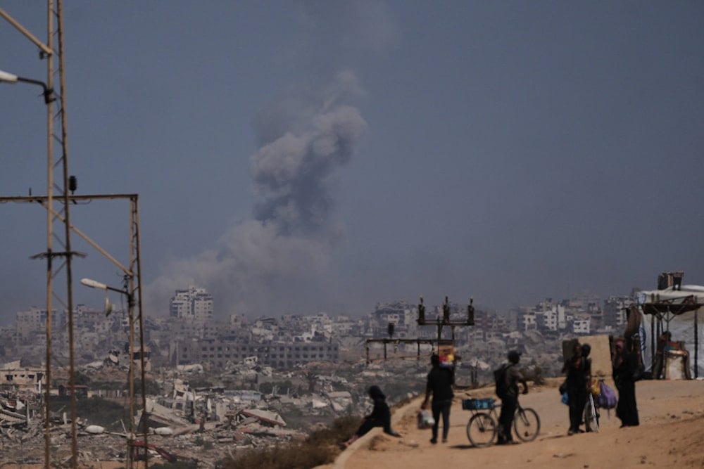 Smoke rises from an Israeli military strike in Gaza City, as seen from the central Gaza Strip, Monday, Sept. 22, 2025 (AP)