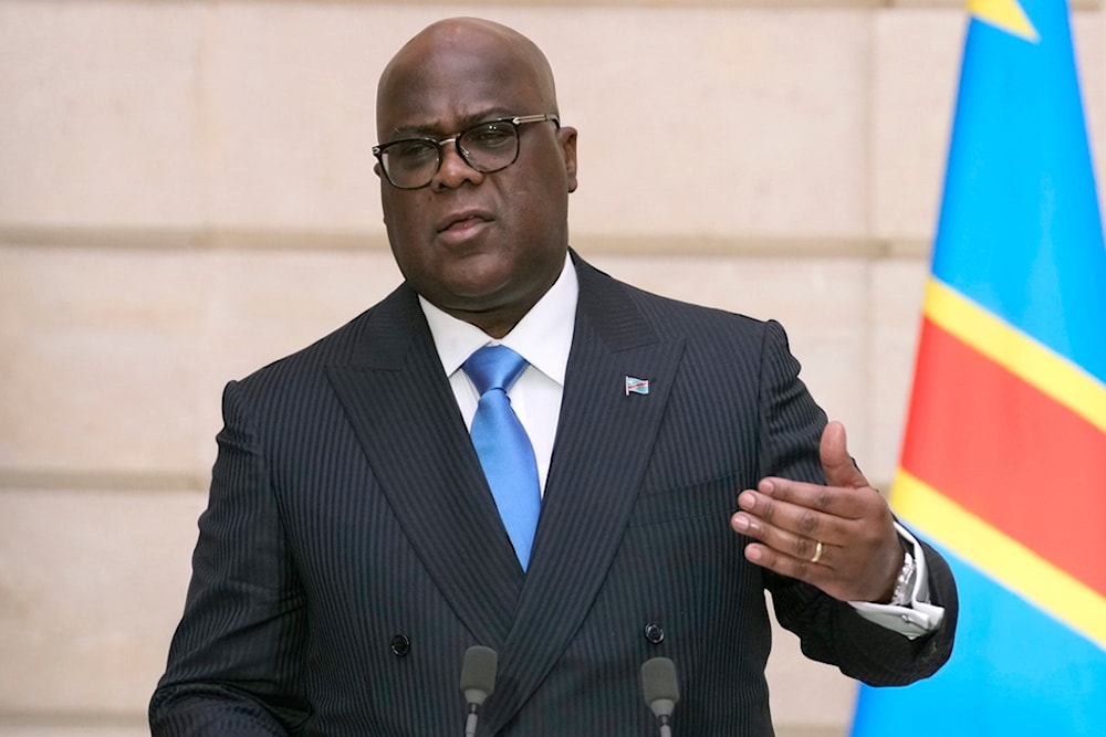 Congo's President Felix Tshisekedi speaks during a press conference with French President Emmanuel Macron at the Elysee Palace in Paris, Tuesday, April 30, 2024. (AP Photo/Christophe Ena)