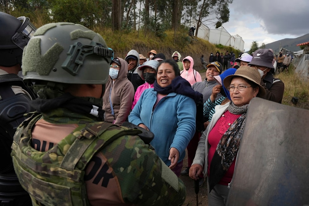 Demonstrators argue with soldiers during an anti-government protest in Tabacundo, Ecuador, Monday, September 22, 2025. (AP Photo/Carlos Noriega)