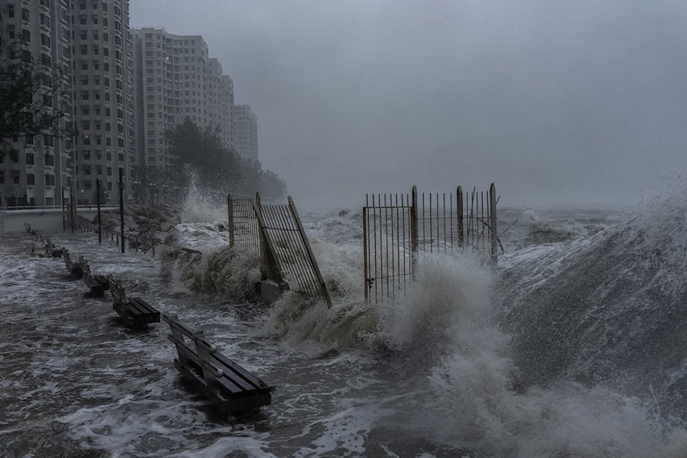 Strong waves crash against the waterfront in Heng Fa Chuen area as Super Typhoon Ragasa approaches in Hong Kong, Wednesday, September 24, 2025. (AP Photo/Chan Long Hei)