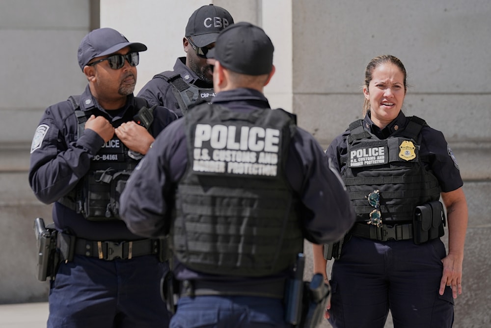 Members of the US Customs and Border Protection Police patrol Union Station, Thursday, August 28, 2025, in Washington. (AP Photo/Mariam Zuhaib)