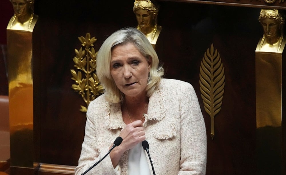 French far-right leader Marine Le Pen addresses the National Assembly, prior to a parliamentary confidence vote of French Prime Minister Francois Bayrou that could bring him down, in Paris, France, Monday, Sept. 8, 2025. (AP Photo/Christophe Ena, File)
