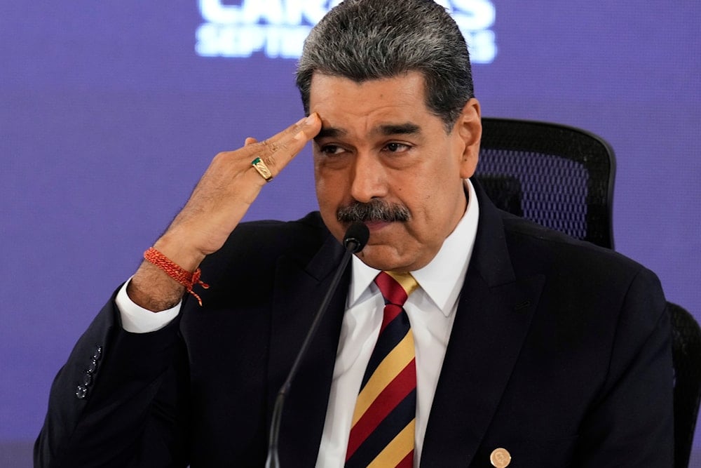 Venezuela President Nicolas Maduro salutes during a press conference in Caracas, Venezuela, Monday, Sept. 1, 2025 (AP)