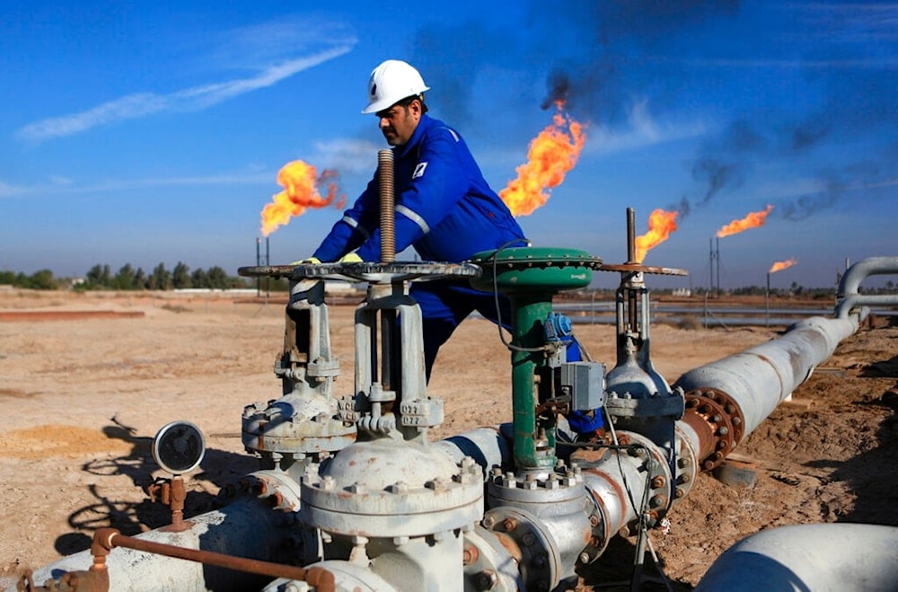  In this Thursday, Jan. 12, 2017 file photo, a worker operates valves in Nihran Bin Omar field north of Basra, Iraq. (AP)