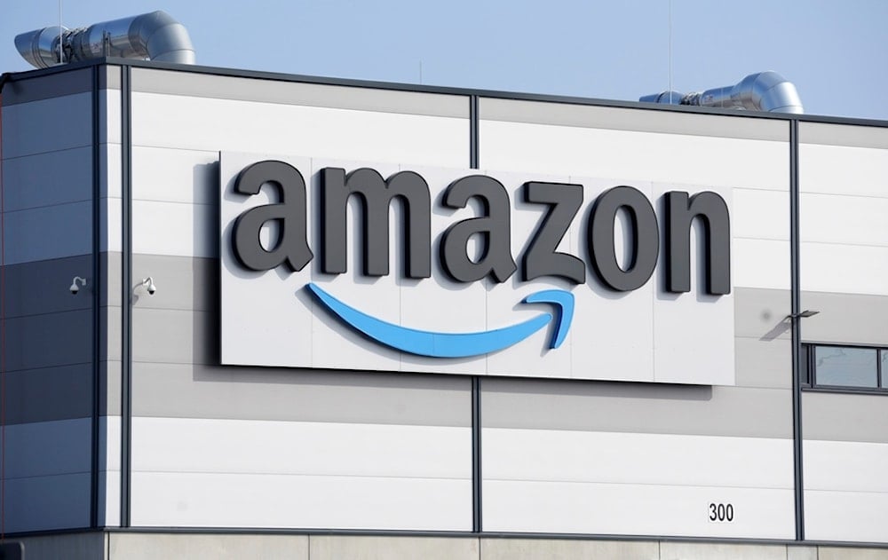 An Amazon company logo marks the facade of a building, March 18, 2022, in Schoenefeld near Berlin, Germany (AP)