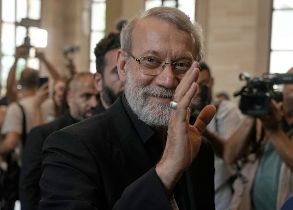 Iranian Secretary of Supreme National Security Council Ali Larijani, greets journalists upon his arrival to meet with the Lebanese parliament speaker Nabih Berri, in Beirut, Lebanon, Wednesday, Aug. 13, 2025 (AP)