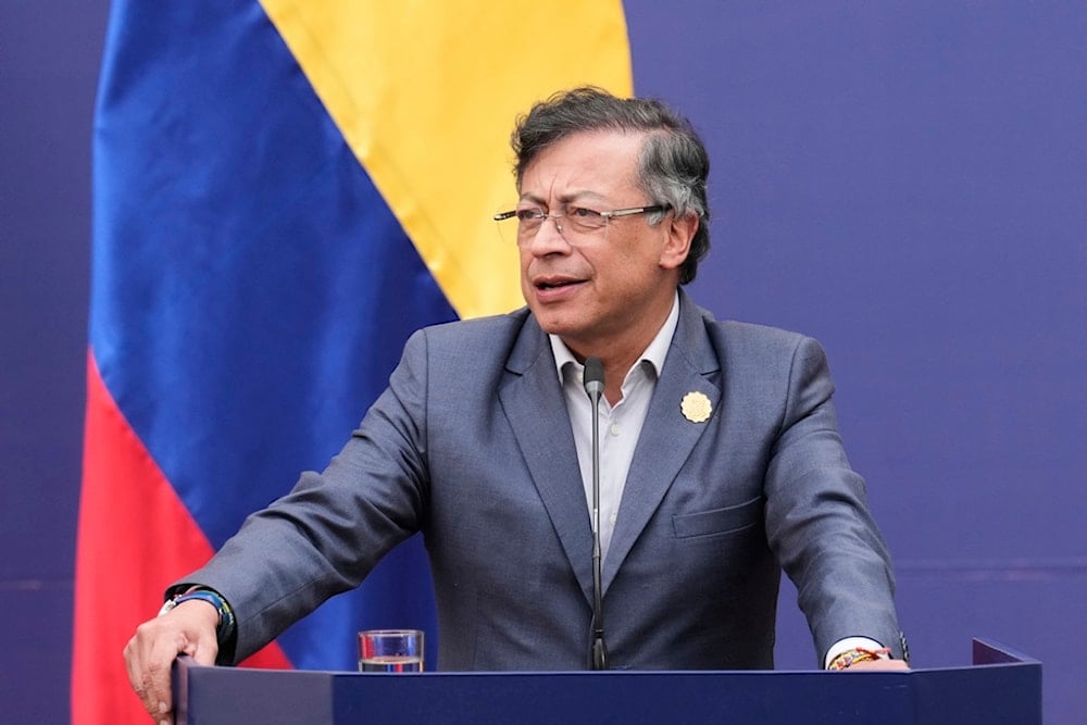 Colombia's President Gustavo Petro gives a statement during a forum on democracy and multilateralism at La Moneda palace in Santiago, Chile, Monday, July 21, 2025. (AP Photo/Esteban Felix)