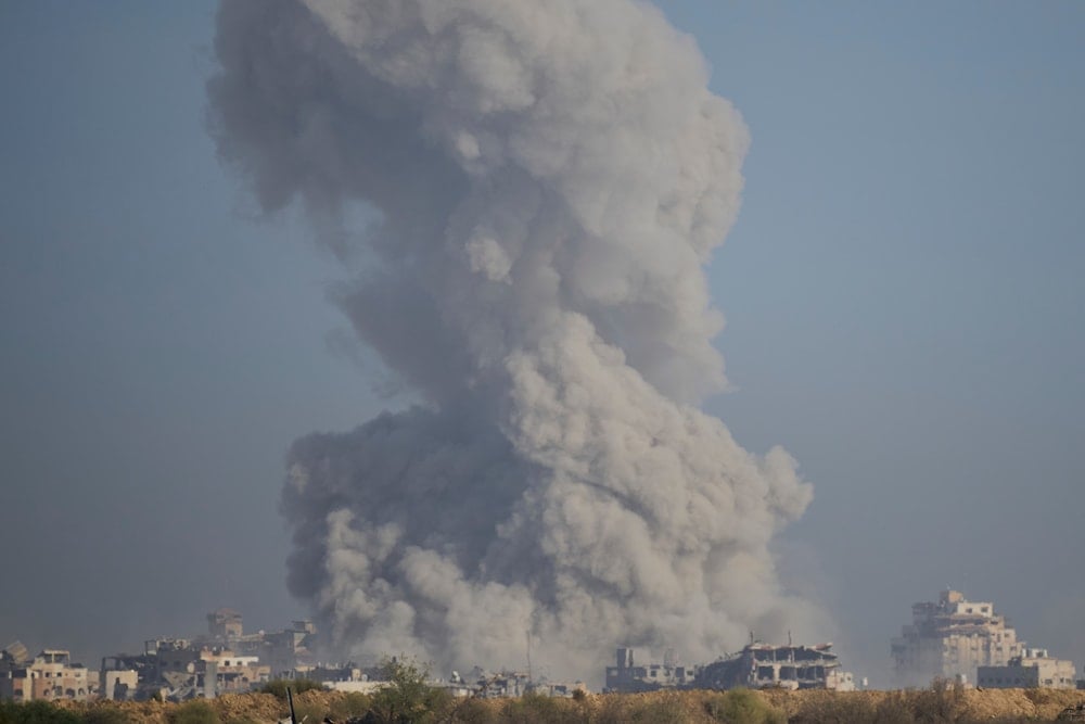 Smoke rises following an explosion in the Gaza Strip, Occupied Palestine, Sunday, Sept. 21, 2025 (AP)