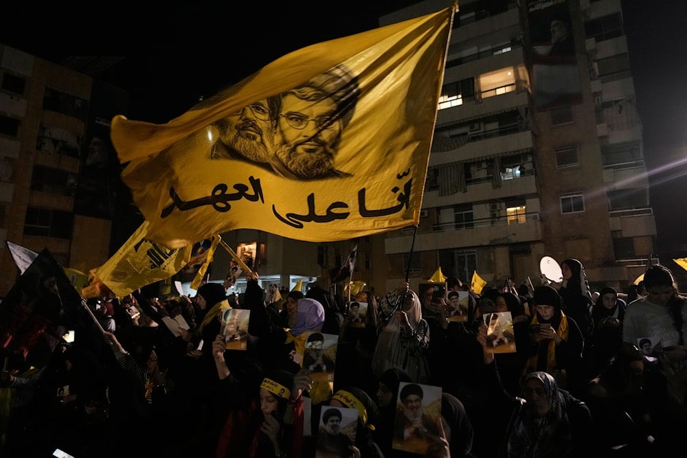 People gather at the site where Hezbollah leader Hassan Nasrallah was killed in Israeli airstrikes on Sept. 27, 2024, a day before the first anniversary of his death, in the Haret Hreik suburb south of Beirut, Lebanon, Friday, April 26, 2025 (AP)