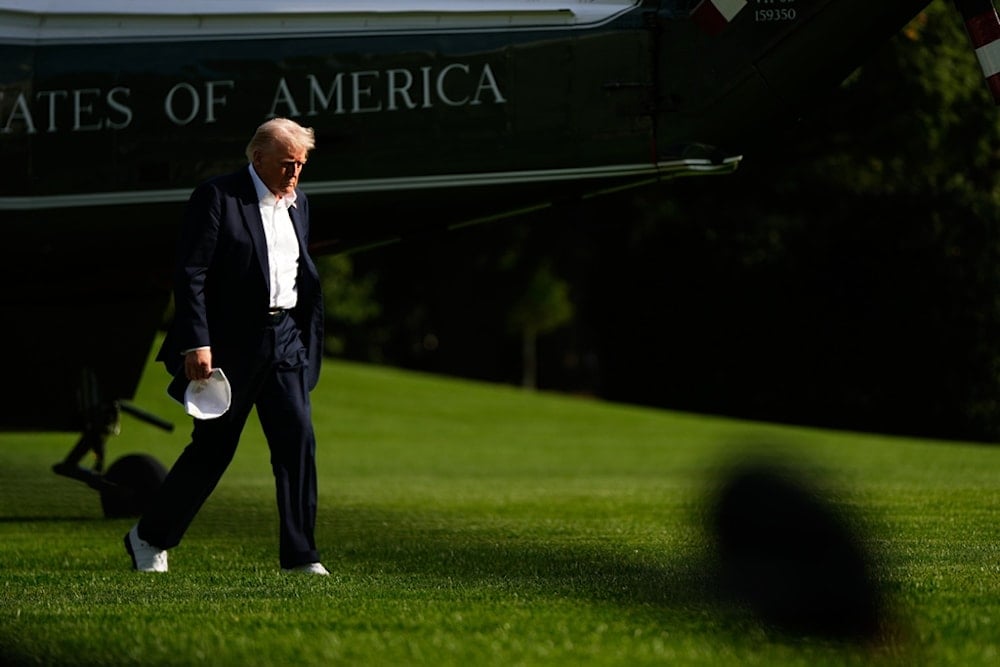 US President Donald Trump arrives at the White House, Friday, September 26, 2025, in Washington. (AP Photo/Julia Demaree Nikhinson)