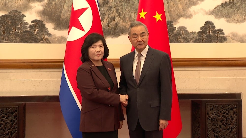 Chinese Foreign Minister Wang Yi (Right) shakes hands with visiting DPRK counterpart Choe Son Hui (Left) in Beijing on Sunday, Sept 28, 2025. (CGTN)