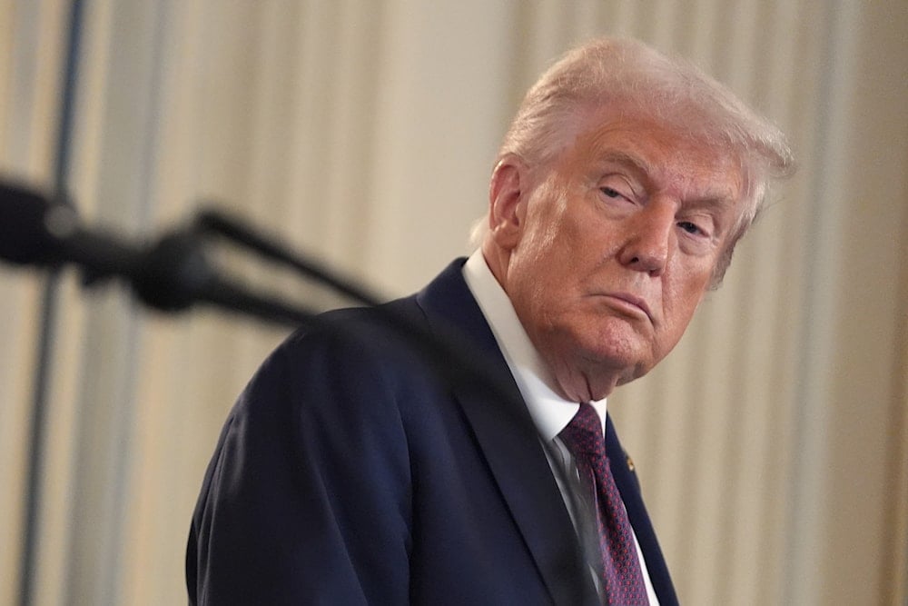 President Donald Trump listens during a news conference with Israeli Prime Minister Benjamin Netanyahu in the State Dining Room of the White House, Monday, Sept. 29, 2025, in Washington (AP)