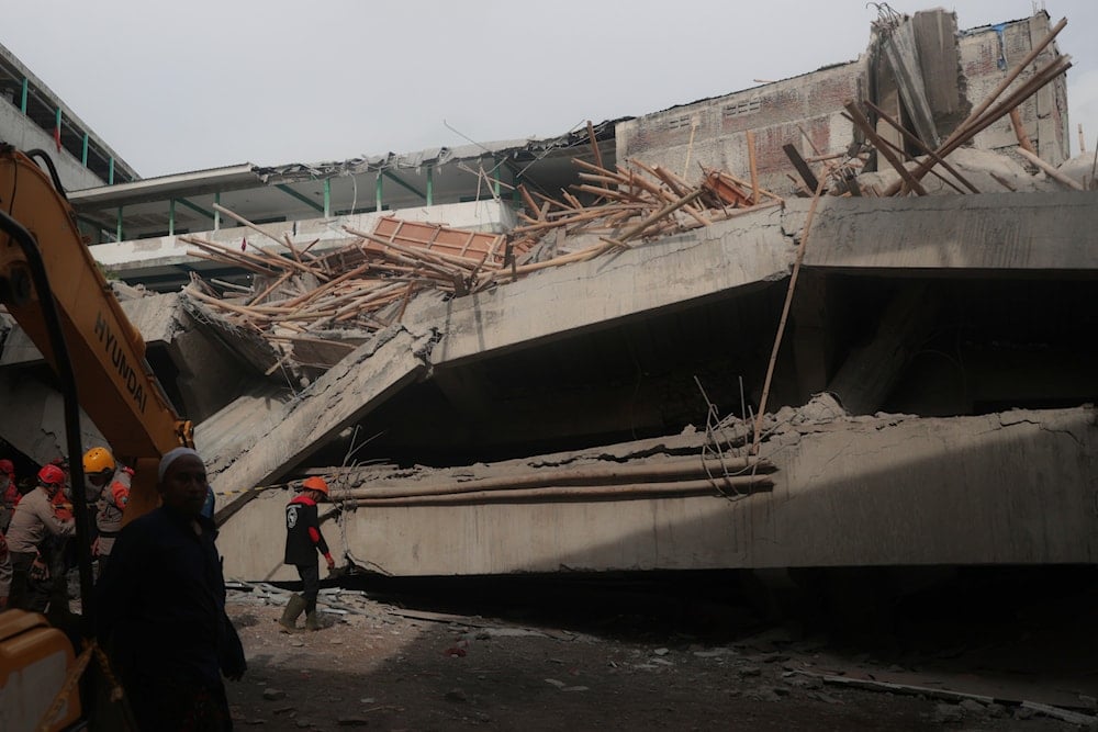 School collapse in Indonesia leaves one dead, dozens trapped, injured