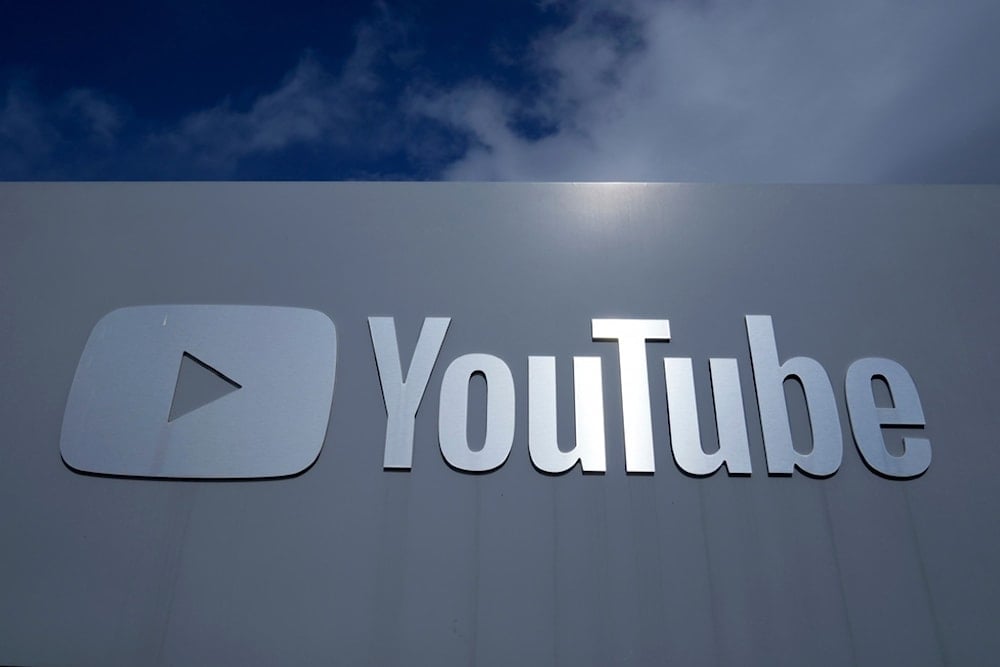 FILE - A YouTube sign is shown near the company's headquarters in San Bruno, Calif., Wednesday, March 12, 2025. (AP Photo/Jeff Chiu, file)