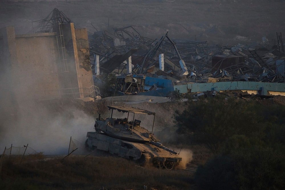 Israeli soldiers drive a tank inside the Gaza Strip as seen from southern Israel, Wednesday, Sept. 3, 2025 (AP)