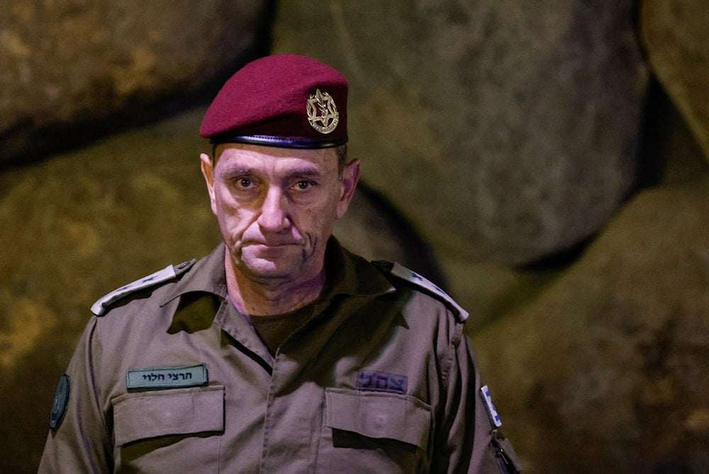 Israeli Chief of the General Staff Herzi Halevi attends a wreath-laying ceremony in al-Quds, Occupied Palestine, May 6, 2024 (AP)