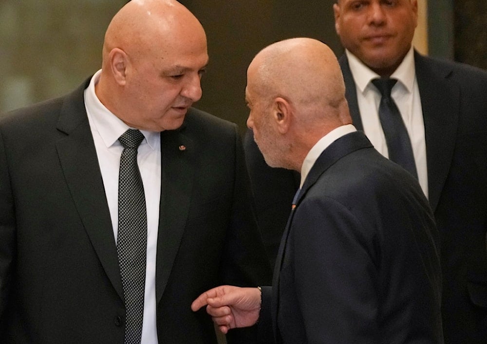 Lebanese President Joseph Aoun, left, speaks with one of his advisors, as he arrives to lead a cabinet meeting, at the Presidential palace in Baabda, east of Beirut, Friday, September 5, 2025 (AP)