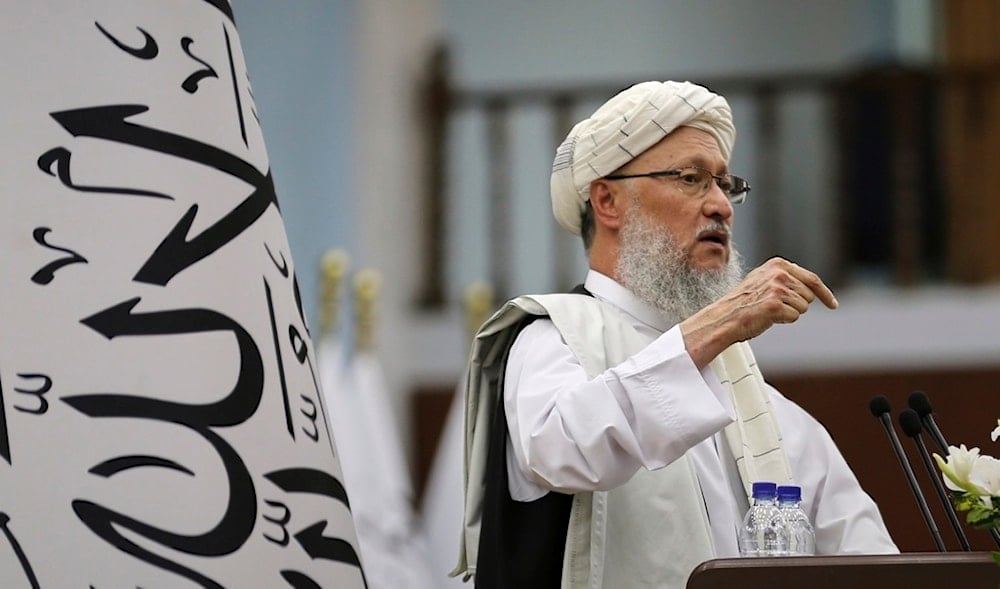 Deputy Prime Minister Abdul Salam Hanafi, addresses Taliban delegates during a meeting celebrating the fourth anniversary of the U.S. withdrawal and the start of Taliban rule, at Loya Jirga Hall in Kabul, Afghanistan, Friday, Aug. 15, 2025. (AP)