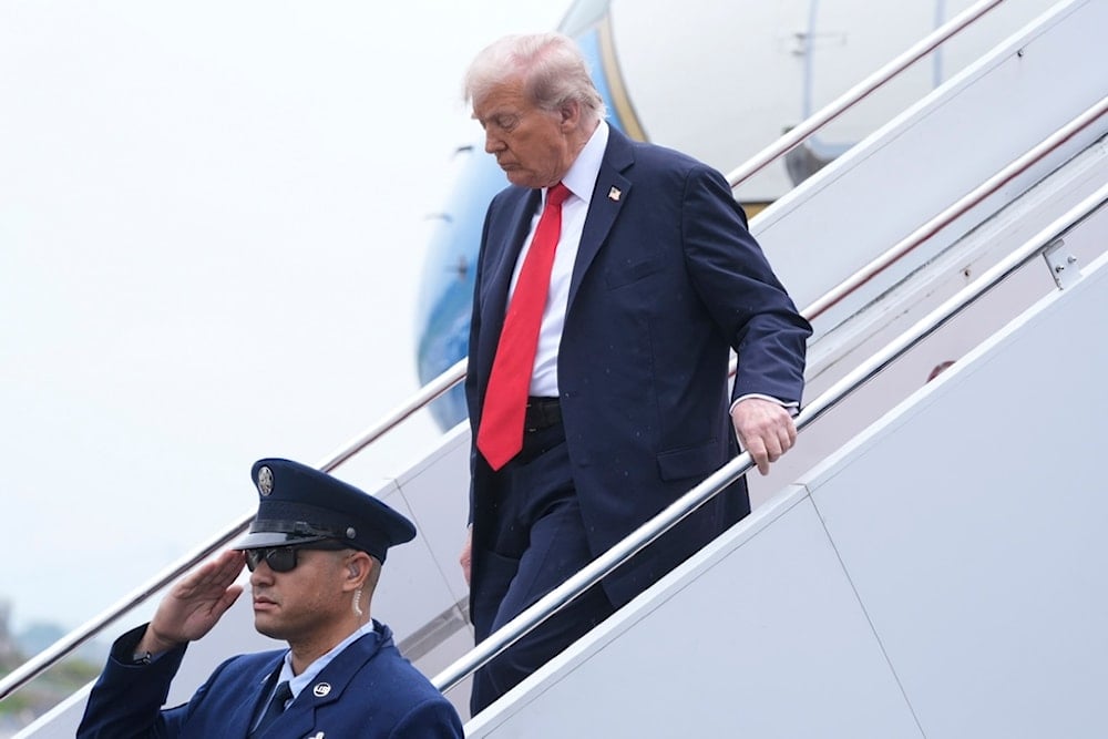 President Donald Trump deplanes Air Force One as he arrives at LaGuardia Airport in New York, Sunday, September 7, 2025 (AP)