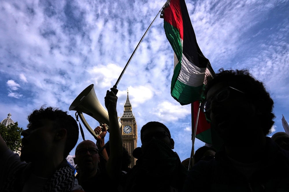 Protesters gather during a protest to support Palestine Action in London, Saturday, Sept. 6, 2025 (AP)