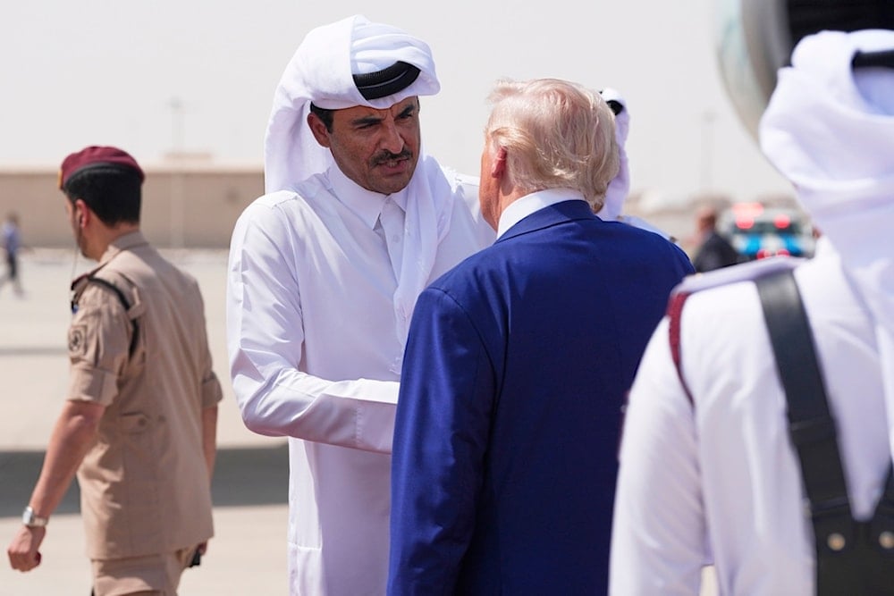 Qatar's Emir Sheikh Tamim bin Hamad Al Thani bids farewell to President Donald Trump at Al Udeid Air Base, Thursday, May 15, 2025, in Doha, Qatar (AP)