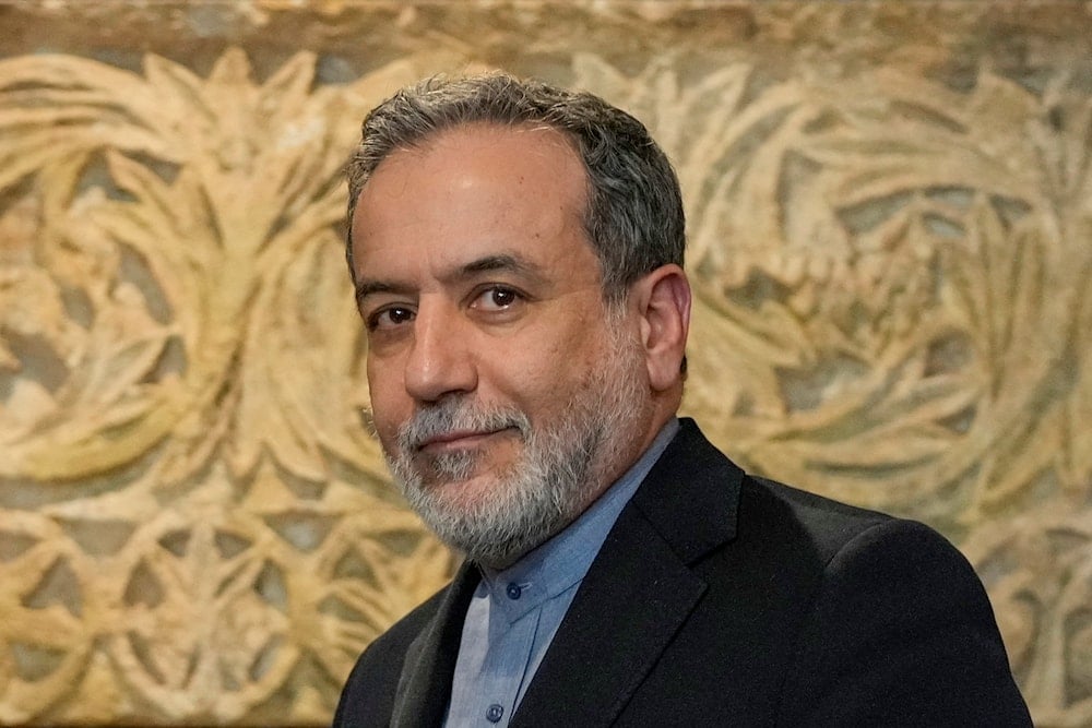 Iranian Foreign Minister Abbas Araghchi meets journalists after his meeting with Lebanese Parliament speaker Nabih Berri, in Beirut, Lebanon, Friday, Oct. 4, 2024 (AP)